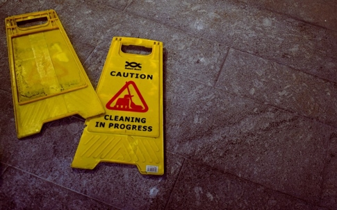 Caution wet floor signs on the floor