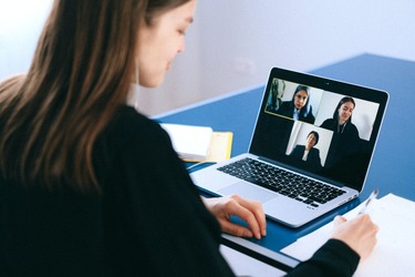 Woman attending a zoom meeting